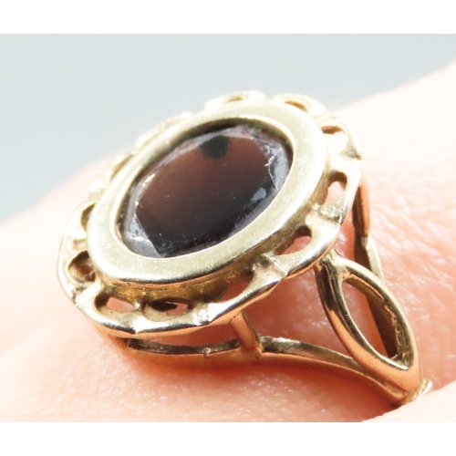 223 - Finely Detailed Bezel Set Smoky Quartz Single Stone Ring Mounted in 9 Carat Yellow Gold Ring Size P