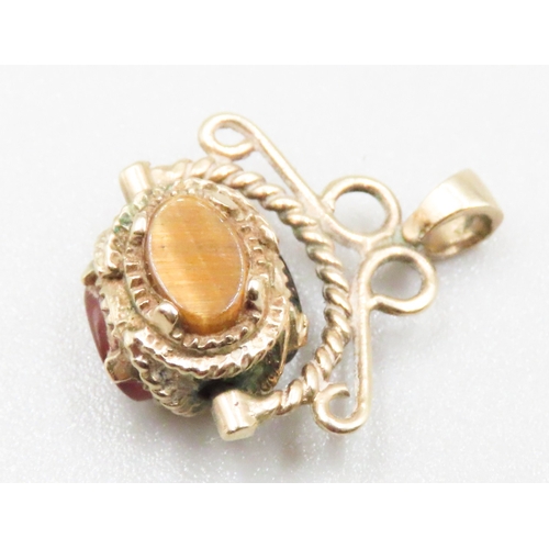 224 - Tigers Eye Carnelian and Onyx Set Swivel Form Pendant Mounted in 9 Carat Yellow Gold 2cm High