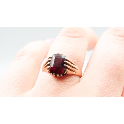 226 - Belcher Set Red Garnet Single Stone Ring Mounted in 9 Carat Yellow Gold Ring Size O