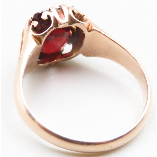 226 - Belcher Set Red Garnet Single Stone Ring Mounted in 9 Carat Yellow Gold Ring Size O