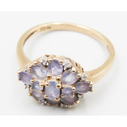 232 - Amethyst and Diamond Set Ladies Floral Form Cluster Ring Mounted in 9 Carat Yellow Gold Ring Size R