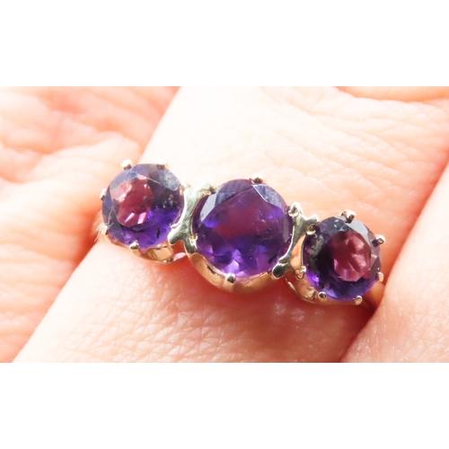 238 - Amethyst Set Three Stone Ring Mounted in 9 Carat Yellow Gold Ring Size P As New Unworn Inherited Jew... 