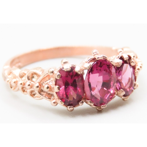 239 - Pink Tourmaline Three Stone Set Ring Finely Detailed Mounted in 9 Carat Rose Gold Ring Size P As New... 