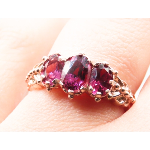 239 - Pink Tourmaline Three Stone Set Ring Finely Detailed Mounted in 9 Carat Rose Gold Ring Size P As New... 