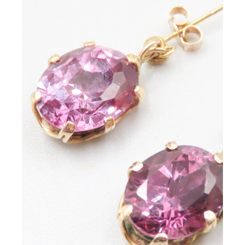 24 - Pair of Basket Set Amethyst Earrings Mounted in 9 Carat Yellow Gold 1.5cm Drop