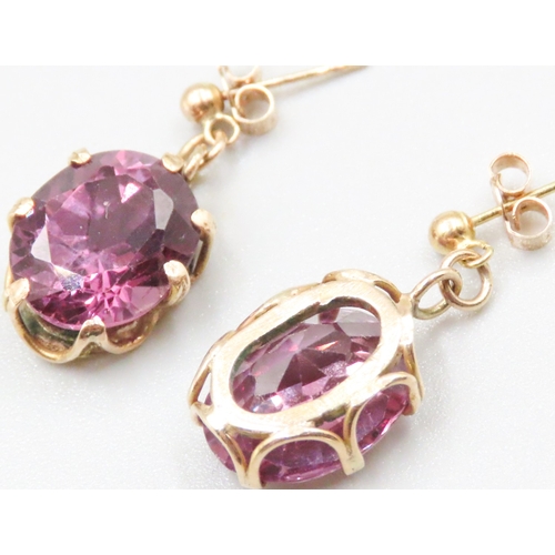 24 - Pair of Basket Set Amethyst Earrings Mounted in 9 Carat Yellow Gold 1.5cm Drop