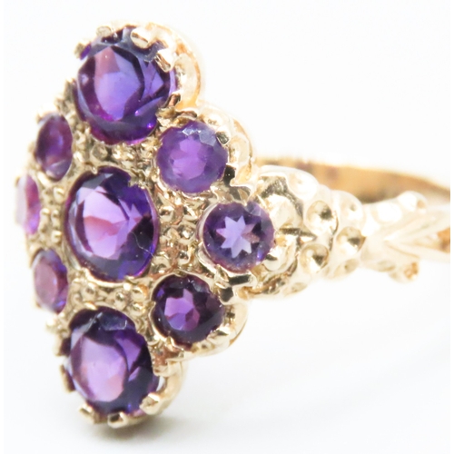 242 - Unusual Form Amethyst Set Nine Stone Ring Mounted in 9 Carat Yellow Gold Ring Size Q As New Unworn I... 