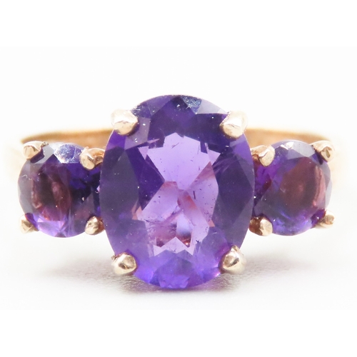 246 - Amethyst Set Three Stone Ring Mounted in 9 Carat Yellow Gold Ring Size O As New Unworn Inherited Jew... 