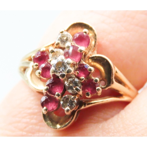 25 - Finely Detailed Ruby and Diamond Set Cluster Ring Mounted in 14 Carat Yellow Gold Ring Size L and a ... 