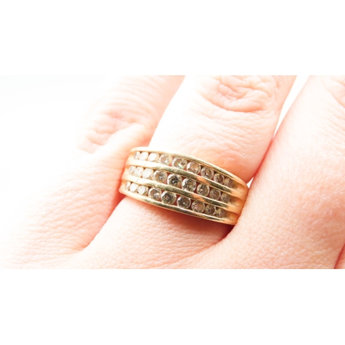 258 - Diamond Set Graduated Form Three Row Ring Mounted in 18 Carat Yellow Gold Ring Size O and a Half