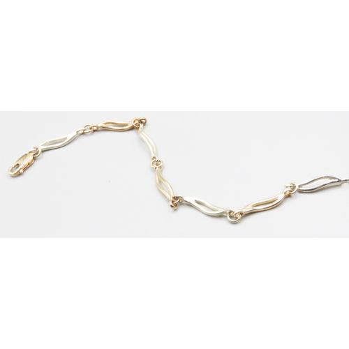 259 - 9 Carat Yellow and White Gold Wave Link Bracelet 20cm Long