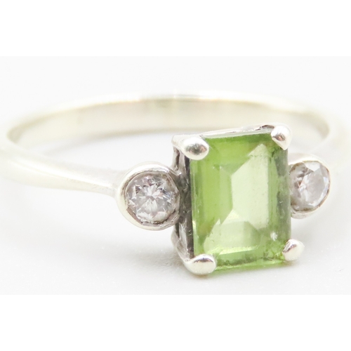 298 - Peridot and Diamond Set Ring Mounted in 9 Carat White Gold Ring Size P