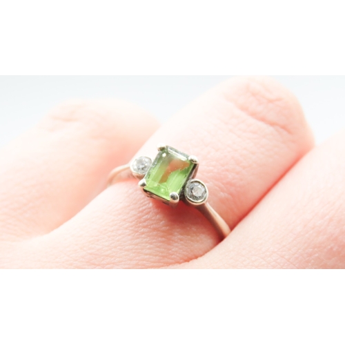 298 - Peridot and Diamond Set Ring Mounted in 9 Carat White Gold Ring Size P