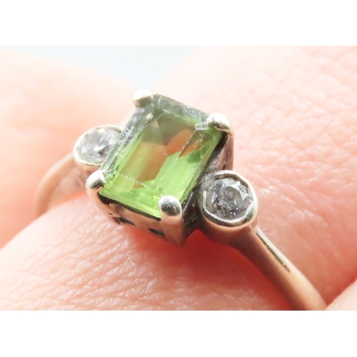 298 - Peridot and Diamond Set Ring Mounted in 9 Carat White Gold Ring Size P