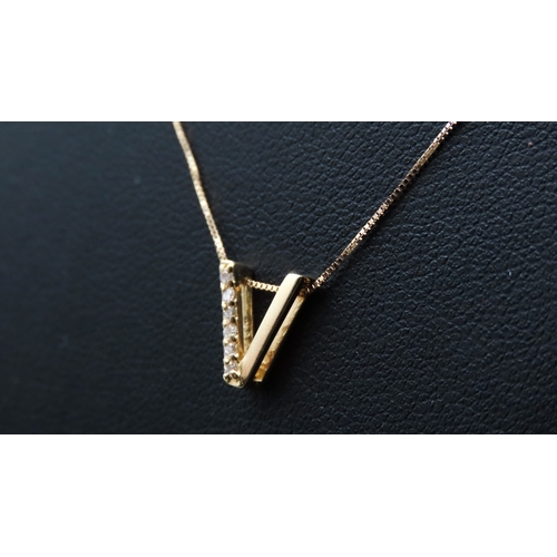 303 - 18 Carat Yellow Gold Diamond Set Pendant 1cm High Set on 18 Carat Yellow Gold Chain 44cm Long