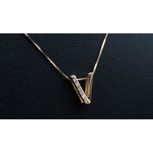 303 - 18 Carat Yellow Gold Diamond Set Pendant 1cm High Set on 18 Carat Yellow Gold Chain 44cm Long