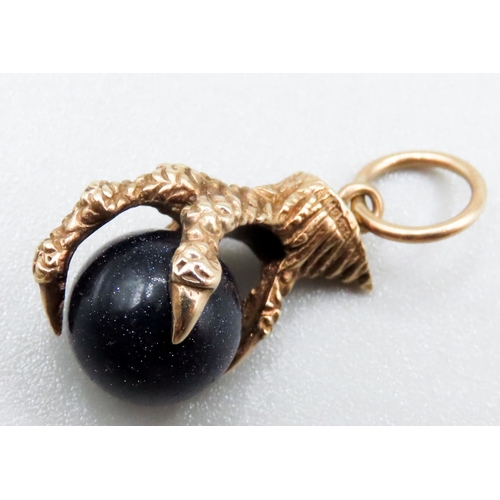 306 - Navy Goldstone Set Claw Pendant Mounted in 9 Carat Yellow Gold 2cm High