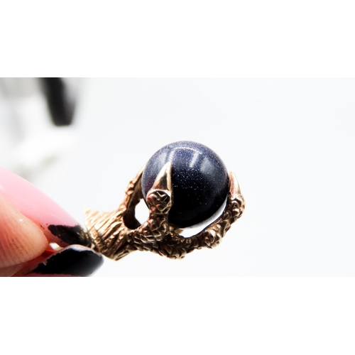 306 - Navy Goldstone Set Claw Pendant Mounted in 9 Carat Yellow Gold 2cm High