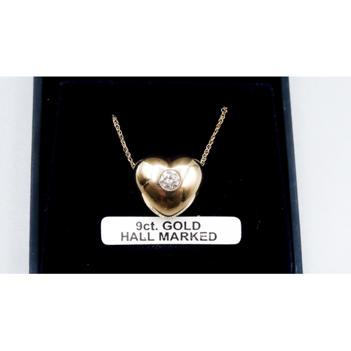 309 - Diamond Set Heart Pendant Mounted in 9 Carat Yellow Gold 1.5cm High set on 9 Carat Yellow Gold Chain... 