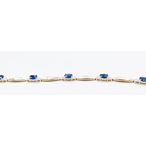 332 - Sapphire Six Stone Set Bracelet with Further Diamond Inset Mounted in 14 Carat Yellow Gold 17.5cm Lo... 