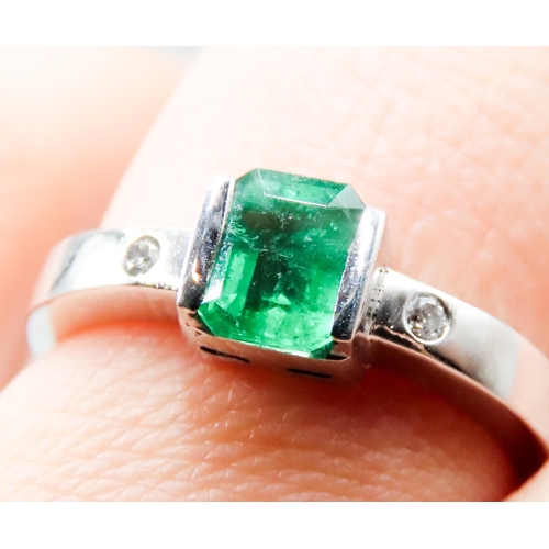 339 - Emerald Half Bezel Set Ring with Diamond Inset to Shoulders Mounted in 18 Carat White Gold Ring Size... 