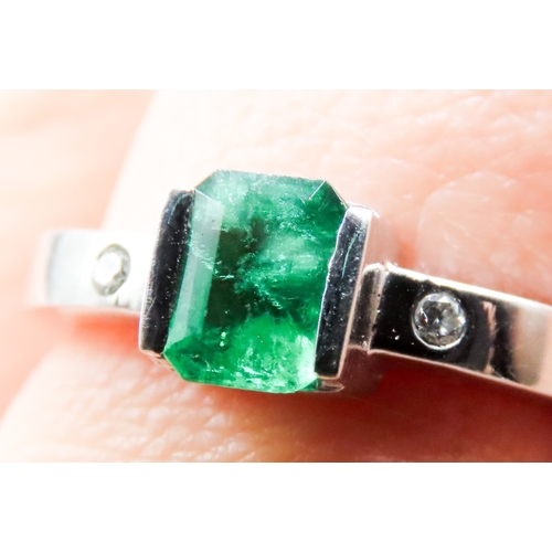 339 - Emerald Half Bezel Set Ring with Diamond Inset to Shoulders Mounted in 18 Carat White Gold Ring Size... 