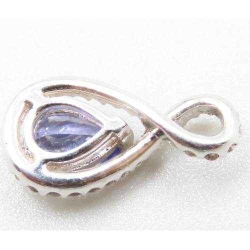 354 - Pear Cut AAA Tanzanite and Diamond Set Pendant Mounted in Silver 2cm High