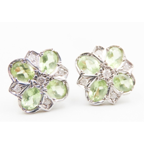 363 - Pair of Peridot and Diamond Set Daisy Form Earrings Mounted in 9 Carat Yellow and White Gold 1cm Hig... 