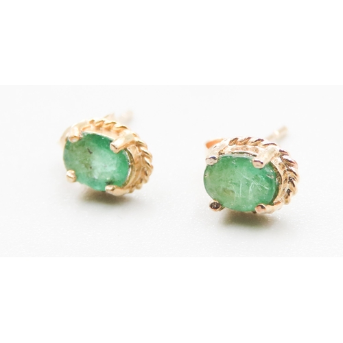 365 - Pair of Emerald Set Ladies Single Stone Earrings Mounted in 9 Carat Yellow Gold 5mm High