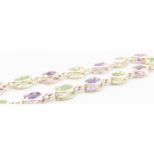 370 - Fifteen Stone Peridot and Amethyst Bezel Set Bracelet Mounted in 9 Carat Yellow Gold 19.5cm Long