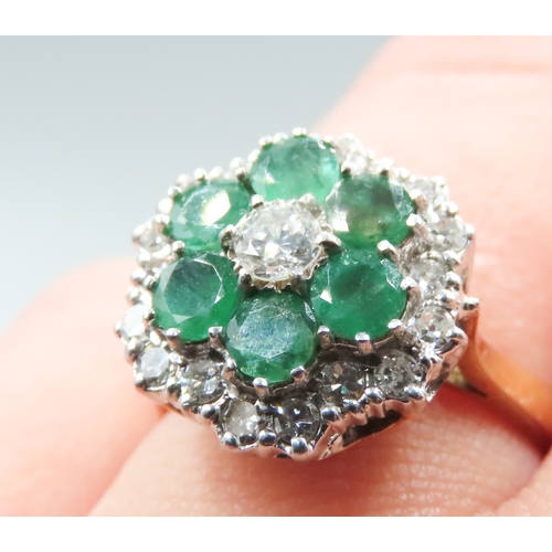 373 - Finely Detailed Emerald and Diamond Set Cluster Ring Mounted in 18 Carat Yellow Gold Ring Size O