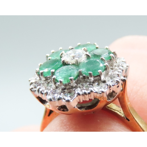 373 - Finely Detailed Emerald and Diamond Set Cluster Ring Mounted in 18 Carat Yellow Gold Ring Size O