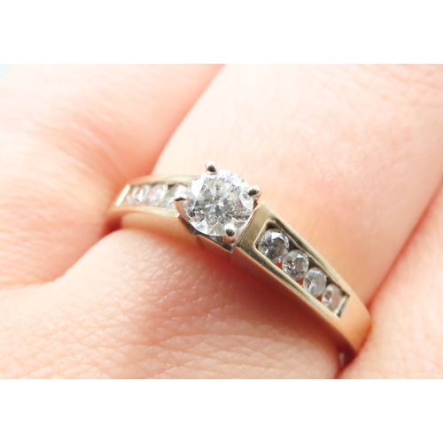 376 - Diamond Set Ring with Further Diamonds Set to Band Mounted in 14 Carat Yellow Gold Ring Size S