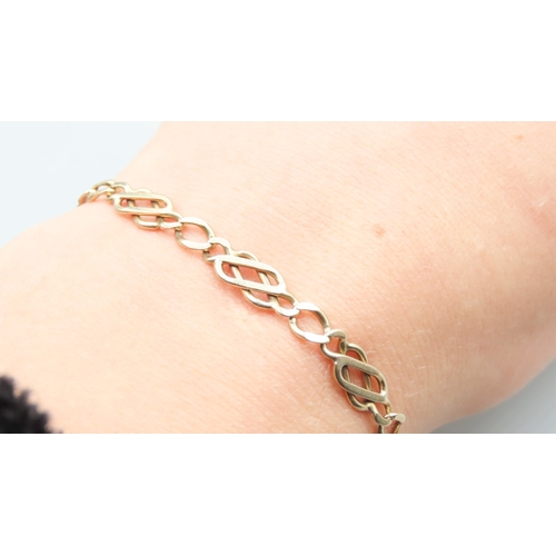 387 - 9 Carat Yellow Gold Celtic Knot Link Bracelet 21.5cm Long