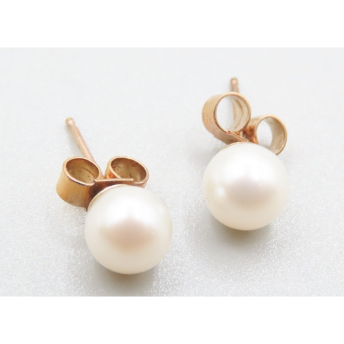 393 - Pair of Pearl Set 9 Carat Yellow Gold Earrings 5mm Diameter Please Note; This Lot and the Following ... 