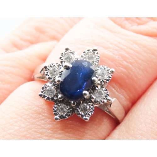 414 - Sapphire and Diamond Set Ladies Cluster Ring Mounted in 9 Carat White Gold Ring Size M As New Unworn... 