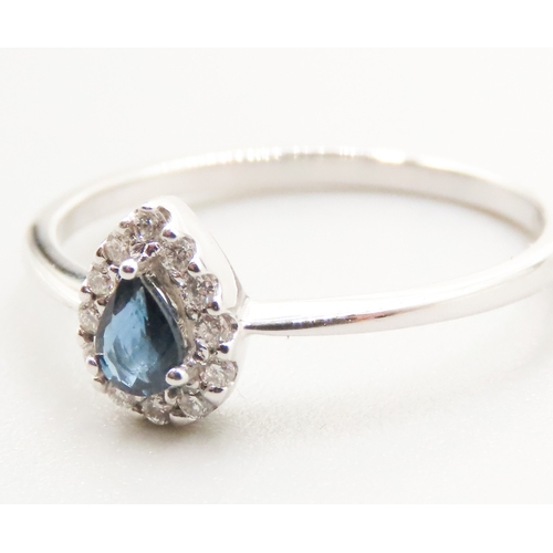 416 - Pear Cut Sapphire Centerstone Ring with Diamond Halo Surround Mounted in 18 Carat White Gold Ring Si... 