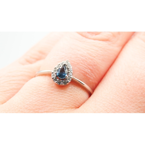 416 - Pear Cut Sapphire Centerstone Ring with Diamond Halo Surround Mounted in 18 Carat White Gold Ring Si... 