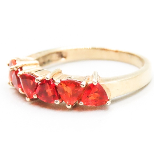 43 - Orange Garnet Six Stone Set Ring Mounted in 9 Carat Yellow Gold Ring Size P and a Half