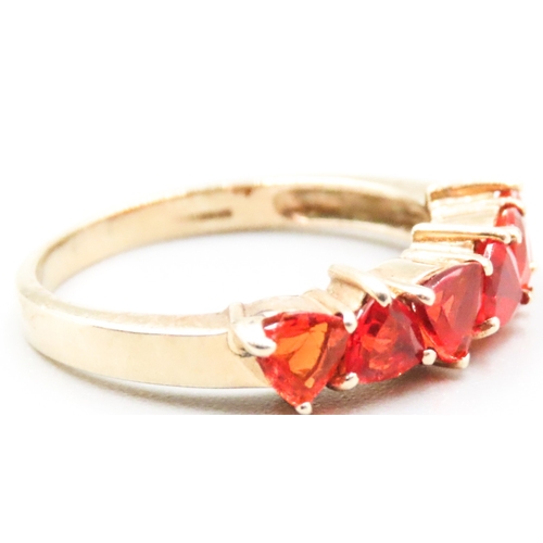 43 - Orange Garnet Six Stone Set Ring Mounted in 9 Carat Yellow Gold Ring Size P and a Half