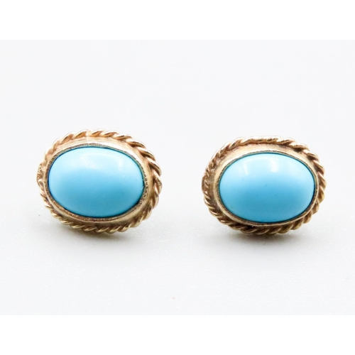 437 - Pair of Turquoise Set Ladies Earrings Mounted in 9 Carat Yellow Gold 1cm High