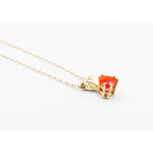 439 - Fire Opal Set Pendant Mounted in 9 Carat Yellow Gold Set on 9 Carat Yellow Gold Chain 48cm note Chai... 