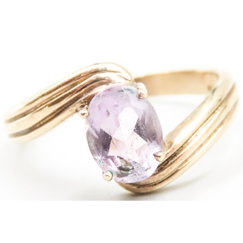 44 - Pale Amethyst Single Stone Ring Wrap Around Form Mounted in 9 Carat Yellow Gold Ring Size P