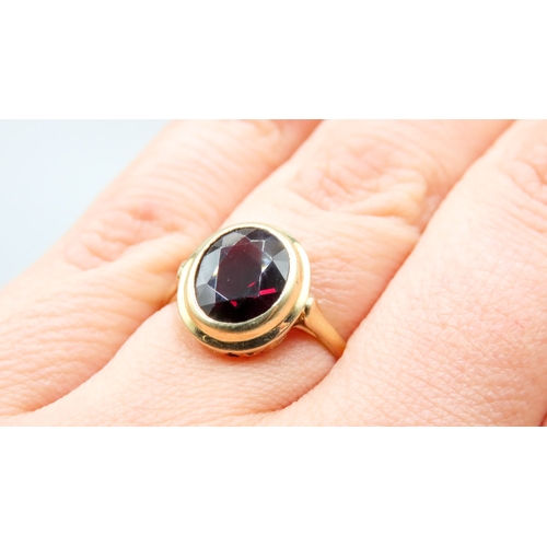 449 - Bezel Set Red Garnet Single Stone Ring Attractively Detailed Mounted on 18 Carat Yellow Gold Ring Si... 