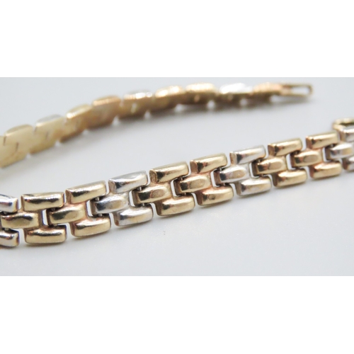 47 - 9 Carat Yellow and White Gold Panther Link Bracelet 18.5cm Long