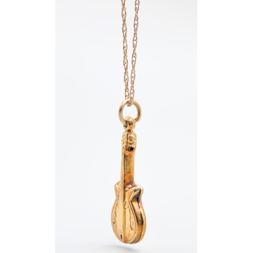 475 - 9 Carat Yellow Gold Guitar Pendant 2.5cm High Set on 9 Carat Yellow Gold Chain 44cm Long