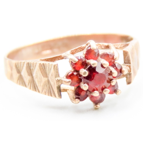 476 - Red Garnet Set Daisy Form Cluster Ring Mounted in 9 Carat Yellow Gold Ring Size I