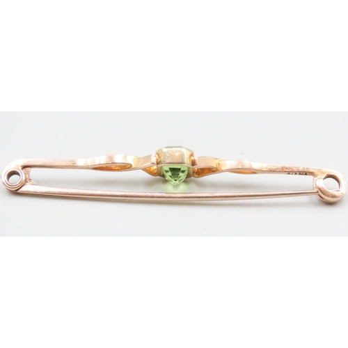 49 - Bezel Set Peridot Brooch Mounted in 15 Carat Yellow Gold 5cm Wide