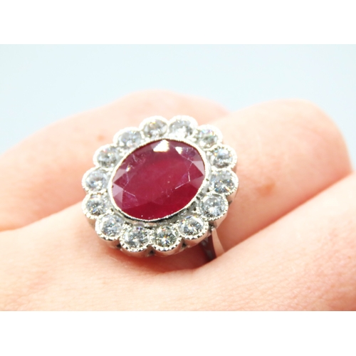 500 - Platinum Set Six Carat Ruby Cluster Ring with 2.5ct of Diamond Ring Size O