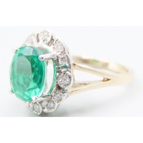 68 - Emerald Triplet Centre Stone Ring with Diamond Set Halo Surround Mounted in 9 Carat Yellow Gold Ring... 